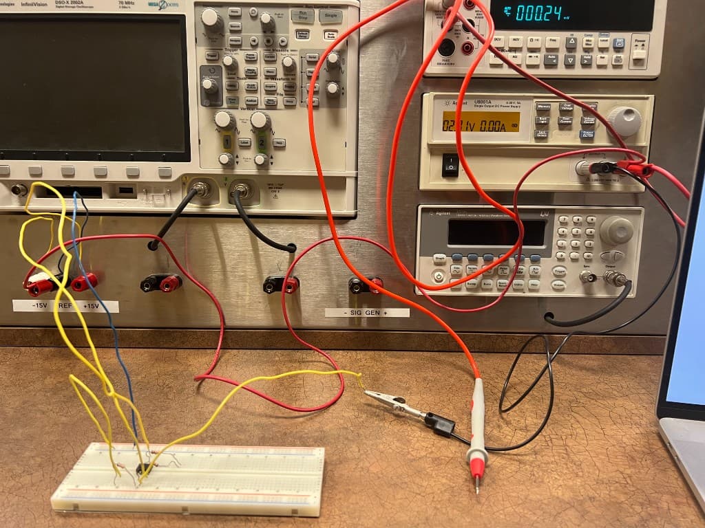 Breadboard circuit on an electronics lab bench